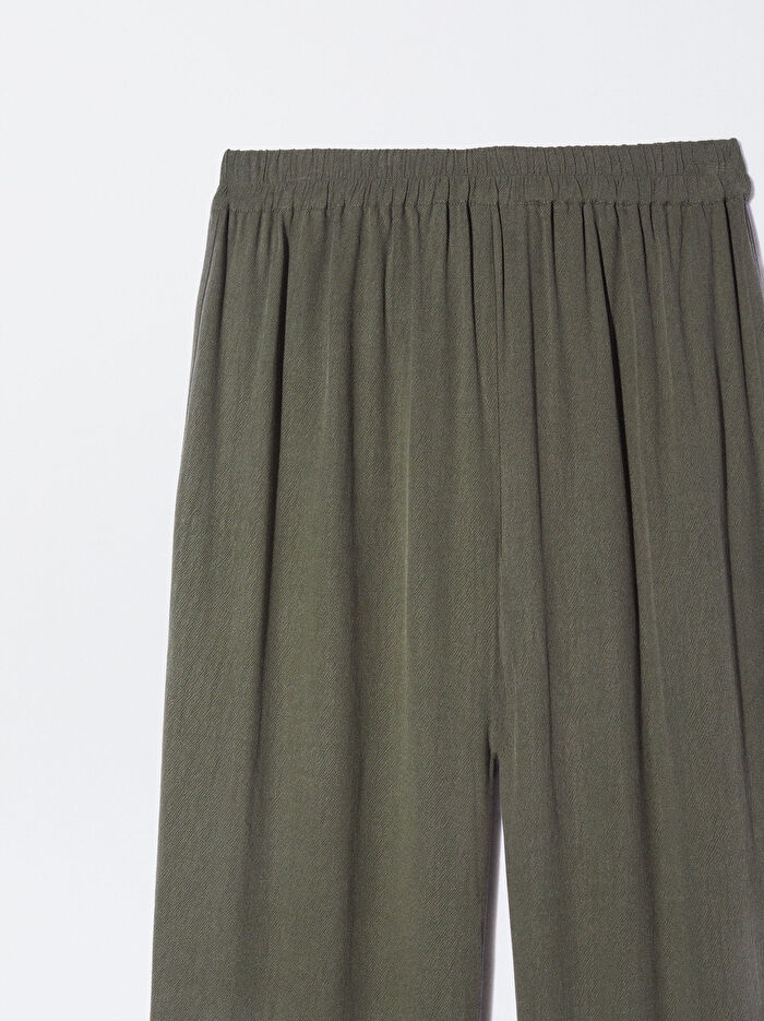 Beli Lastikli Bol Kesim Pantolon