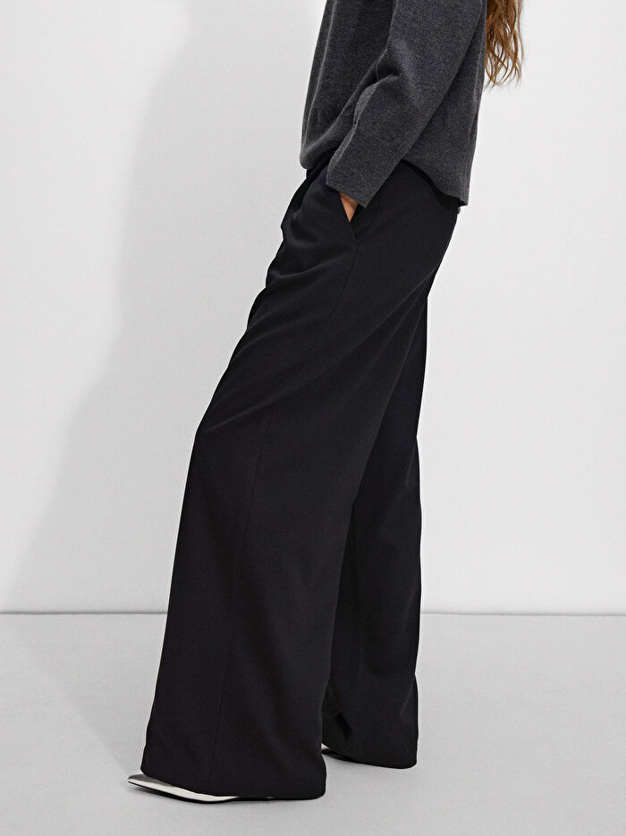 Pile Dökümlü Pantolon