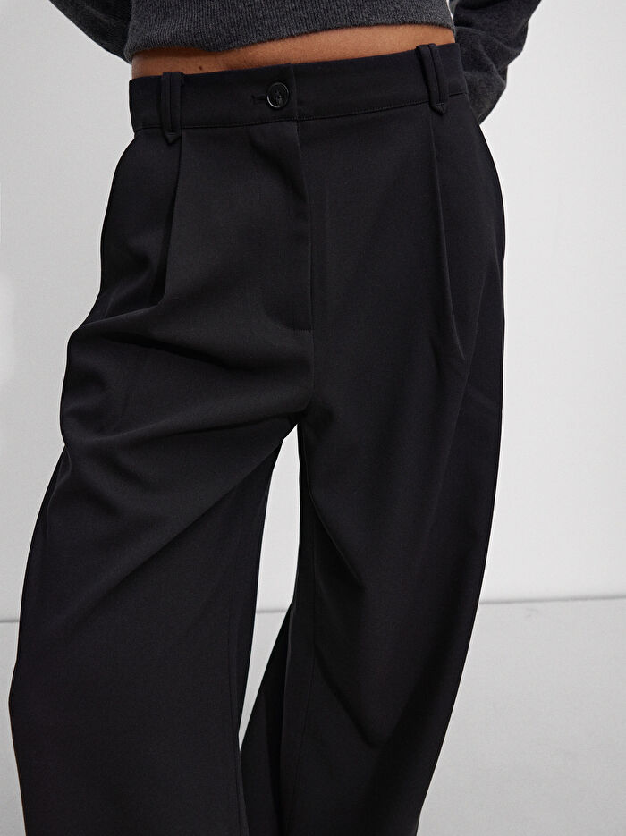 Pile Dökümlü Pantolon