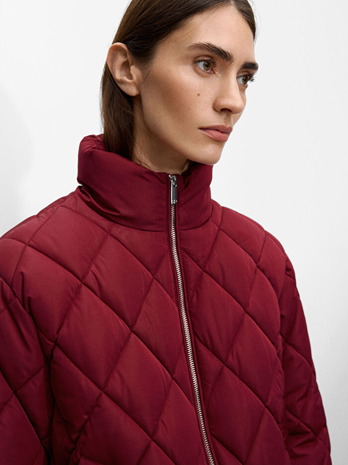 Yüksek Yaka Kapitone Mont