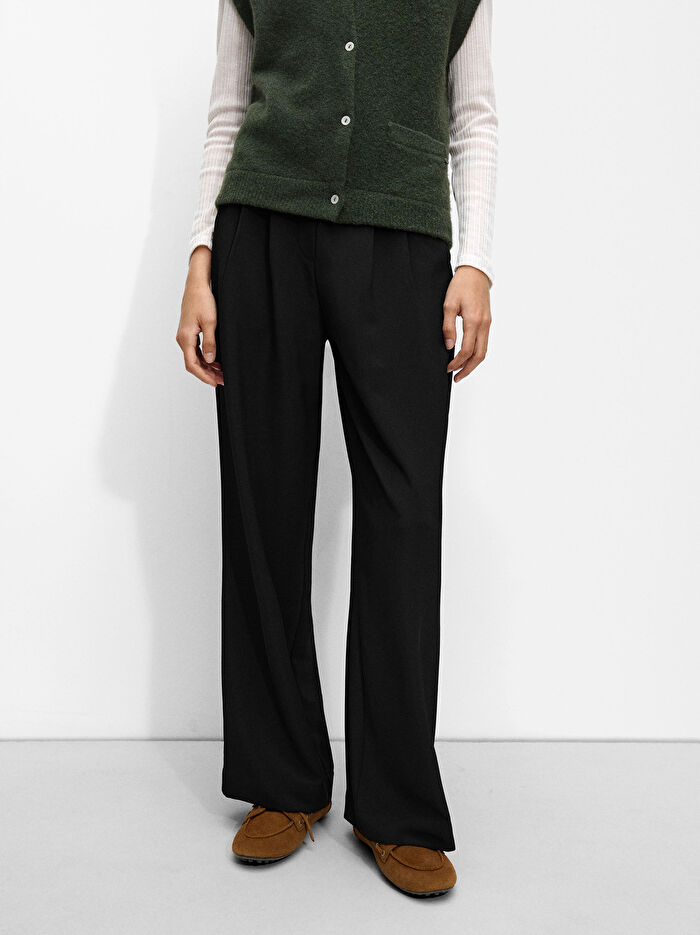 Pile Dökümlü Pantolon