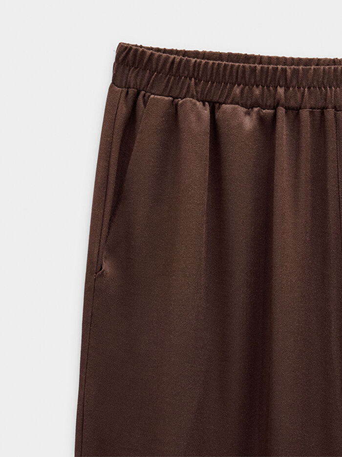 Beli Lastikli Dökümlü Pantolon