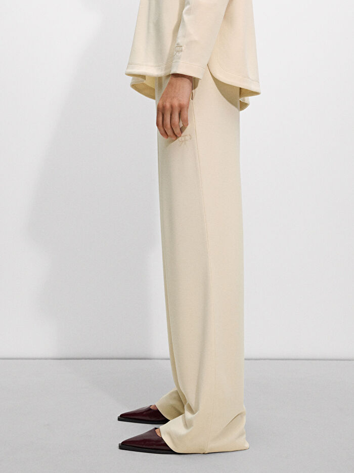 Elastik Bel Bantlı Bol Paça Pantolon