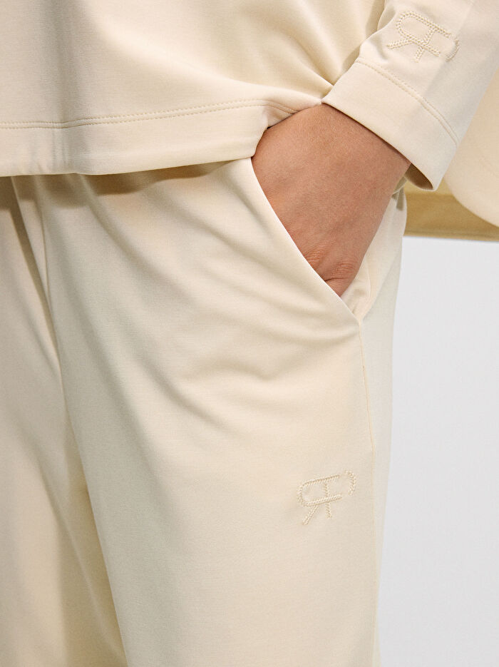 Elastik Bel Bantlı Bol Paça Pantolon