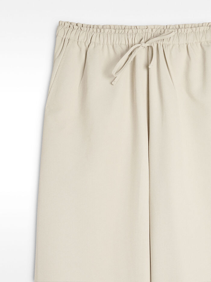 Beli Lastikli Ve Ayarlama İpli Pantolon