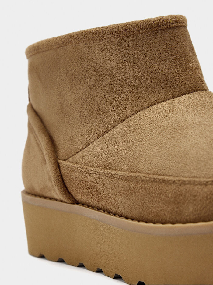 Astarlı Deri Efektli Bilekte Bot